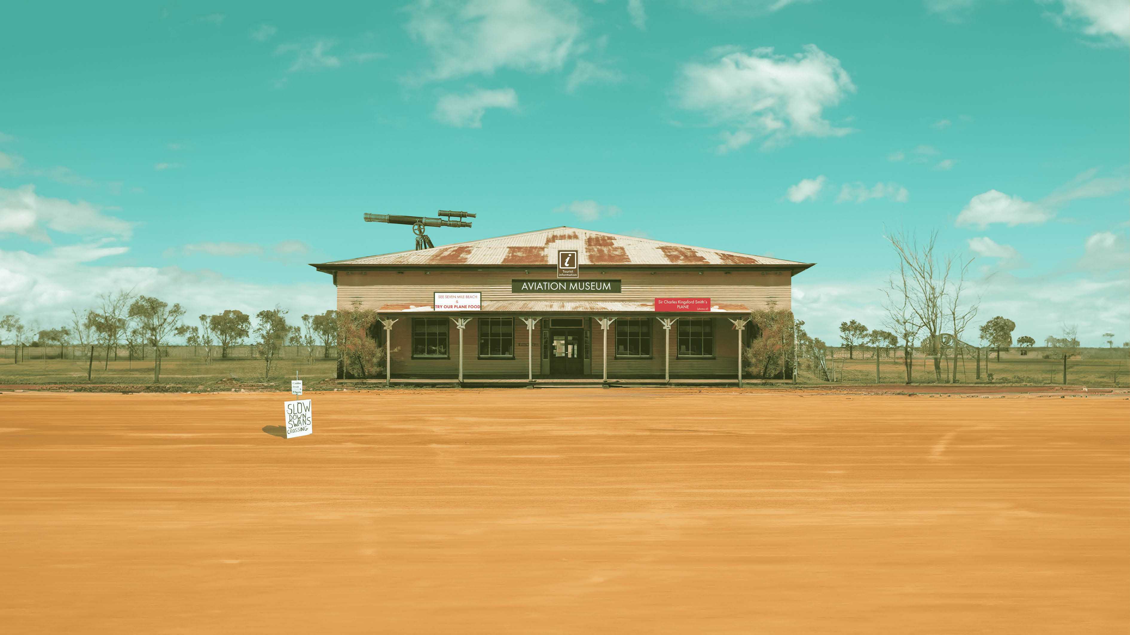 Wes Anderson-style facade render for an Aviation Museum in Gerroa, NSW. This is the second rest stop of the fictional film titled: "The Highway Orcinus."